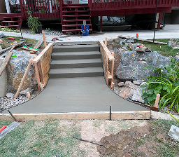 Concrete walkway and steps installation